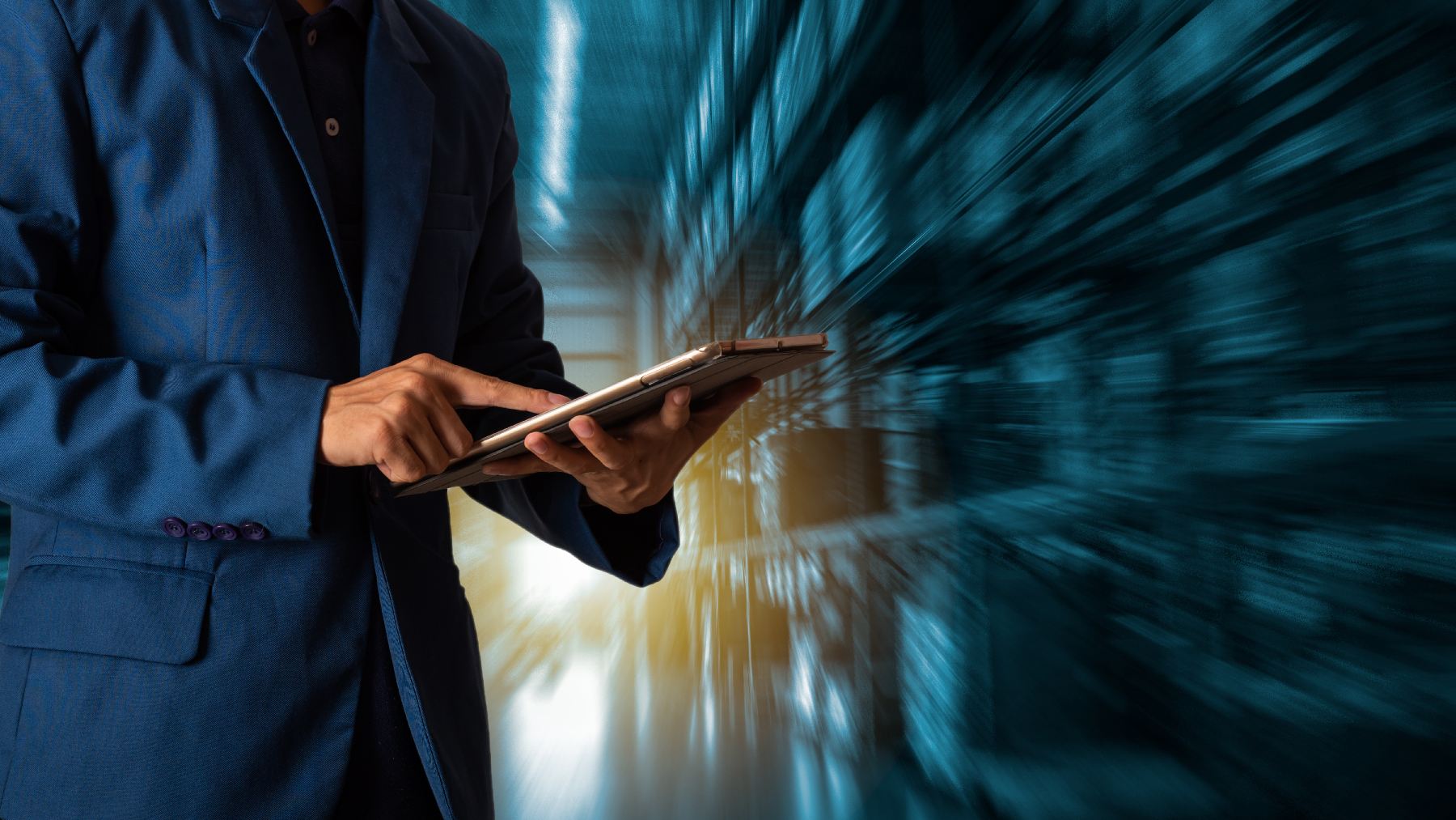 Stock image of a business person looking at a tablet